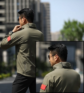 Close-up of tactical shark skin jacket with Chinese flag patch and windproof collar detail