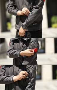 Detail view of tactical softshell jacket with zippers and arm velcro patch features