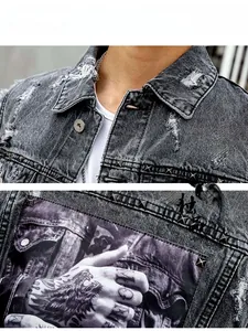 Detail display of grey denim vest with distressed holes, metal studs and wolf art print