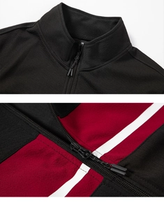 Detail of color-block tracksuit jacket with half-zip stand collar and smooth texture