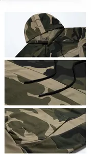 Detail view showing camouflage hoodie drawstrings and embroidered logo on heavy cotton fabric