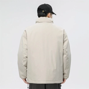Back view of a beige high-street jacket showing loose-fitting design and premium fabric
