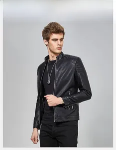 Detail of shoulder quilting on a black faux leather bomber jacket for men in biker style