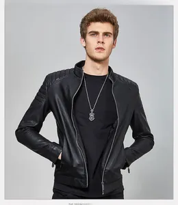 Close-up of black PU leather biker jacket featuring pleated shoulder details and stand collar