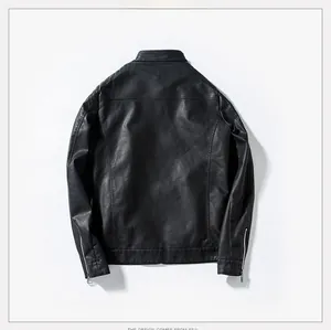 Detail view of the stand collar and reinforced shoulder stitching on this black PU jacket