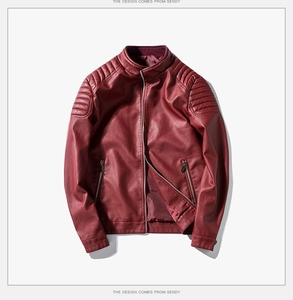 Detail of burgundy PU leather jacket featuring striped quilted shoulders and metal zip pockets