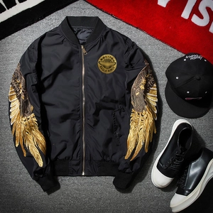 Black MA-1 bomber jacket featuring golden eagle wing embroidery and chest badge