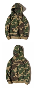 Detailed view of camouflage hoodie featuring drawstring hood and kangaroo pocket