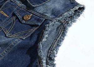 Men's slim fit distressed blue denim vest with flap pockets and frayed edge detailing