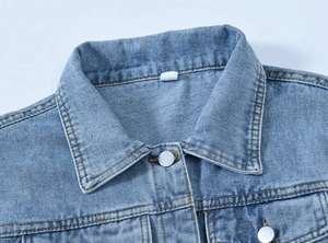 Classic light blue loose denim jacket with metal buttons and neat contrast stitching