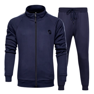 Ensemble de survêtement homme bleu marine avec bandes blanches et veste zippée