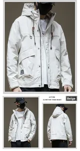 Detail view of a beige hooded cargo jacket with multi-pocket design and windproof fabric