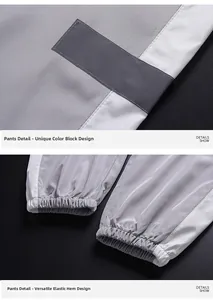 Détails de coutures contrastées gris et blanc et bas élastiques sur pantalon de sport