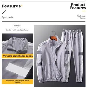 Détail d'un survêtement gris avec bandes réfléchissantes et col montant pour homme