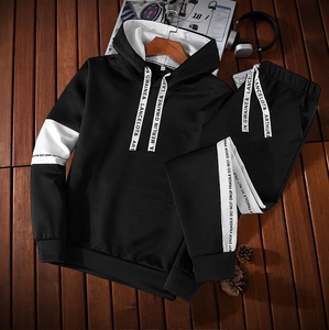 Men's autumn black tracksuit set with white contrast stripes on hoodie and joggers