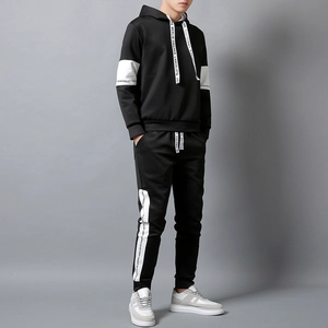 Men's autumn black hooded sports tracksuit with white patchwork and lettered taping