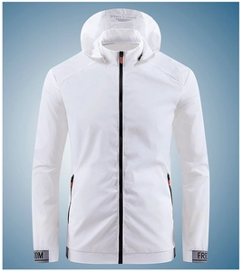 Close-up of white sun protection jacket with black zipper and orange accent details