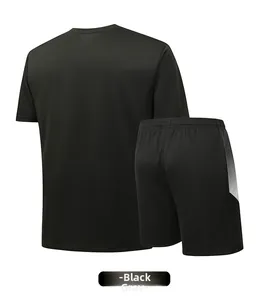 Back view of men's quick-dry black sports set with gradient grey detail on shorts