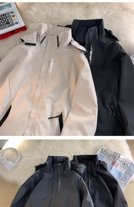 Detail of high-neck windproof hooded outdoor jacket with EXPLORE letter print and velcro cuffs
