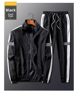 Détails du survêtement réfléchissant noir avec bandes blanches et texture en polyester