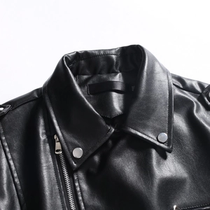 Slim fit black faux leather biker vest featuring silver snap buttons and a notch lapel