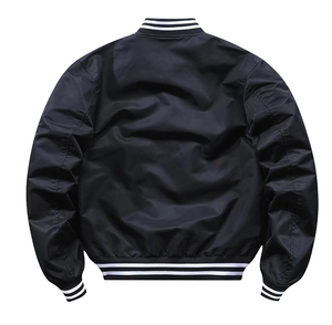 Rear view of black varsity bomber jacket with white striped ribbed collar and hem