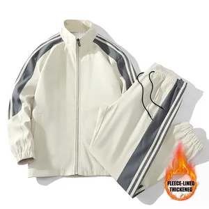 Men's casual fleece track suit with zip-up jacket and striped trousers in cream and grey
