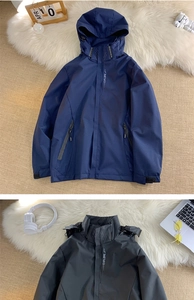Detail of hooded jackets showing EXPLORE lettering and waterproof zippers on fabric