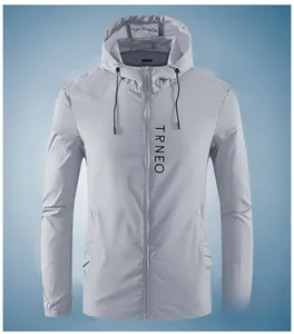 Detail of light gray sun protection jacket showing zip front and elastic cuffs