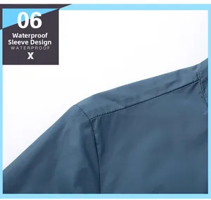Detail of blue sun protection jacket showing waterproof fabric and shoulder seam design
