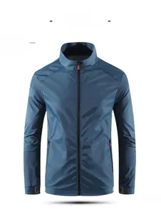 Close-up of blue stand-collar sun protection jacket with zippered pockets and FR/M sleeve trim