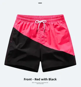 Detail of red and black quick-dry swim trunks featuring elastic waist and white drawstring