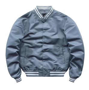Detail of grey-blue baseball jacket with white striped ribbed collar and snap buttons