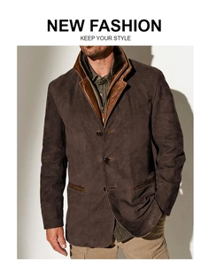 Detail view of brown suede jacket with leather collar trim and metallic zipper pockets