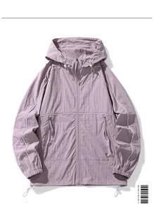 Detail view of purple hooded sun protection jacket with white piping and zipper pockets