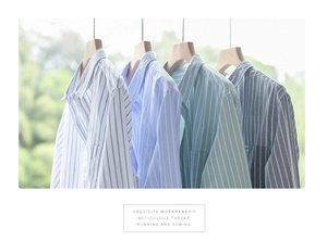 Vertical row of striped cotton shirts in blue, green, and gray with button-down collars
