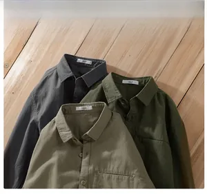 Detail of cotton work shirt collar and Large size label in grey and olive colors