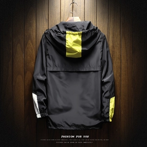 Men's hooded windbreaker jacket with black and yellow contrast sleeves and back vent