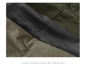 Detail of high-density cotton fabric layers in olive and grey with reinforced stitching