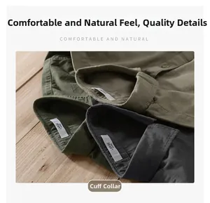 Close-up of olive green and grey men's cotton shirts featuring classic lapel collar detail