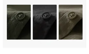 Close-up detail of reinforced buttons and twill cotton texture on men's casual work shirts