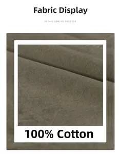 Detail showing the 100% cotton olive green fabric texture and premium sewing process