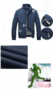 Detail of men's navy blue casual jacket showing metal zipper and shoulder stitching