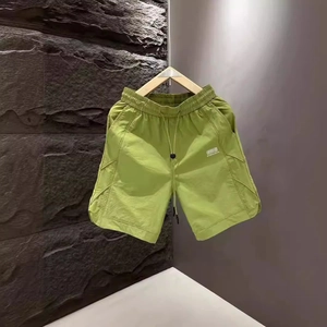 Men's lightweight quick-dry casual shorts in lime green with elastic drawstring waist