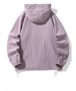 Detail of lilac hooded sun protection jacket with adjustable drawstring hem and elastic cuffs