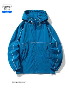 Detail view of the force blue hooded jacket showing white drawstrings and zipper pockets