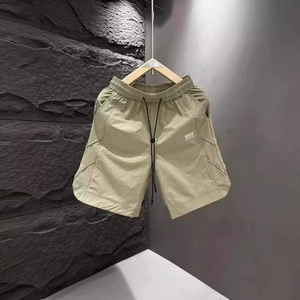 Men's lightweight quick-dry casual shorts with elastic drawstring waist in light khaki