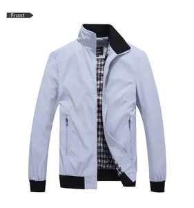 Detailed view of casual men's jacket showing plaid lining and metal zipper closure