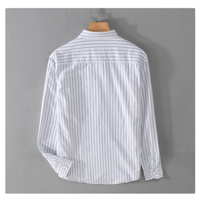 Rear view of striped cotton men's shirt in white and grey-blue on a wooden hanger