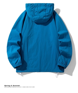Detail view of royal blue hooded sun protection jacket with elastic cuffs and drawstring hem